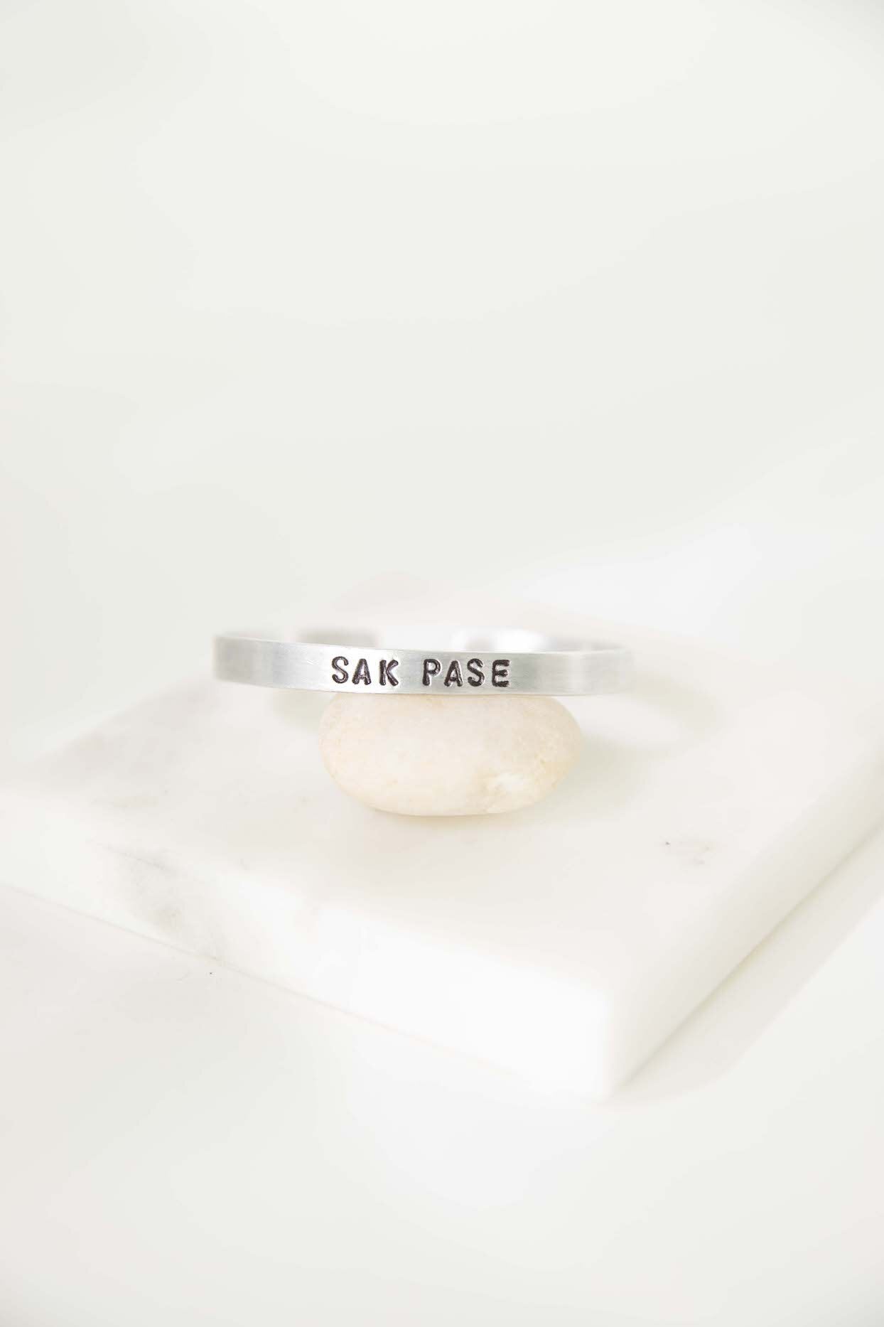 Aluminum Story Cuff - Haitian Phrases